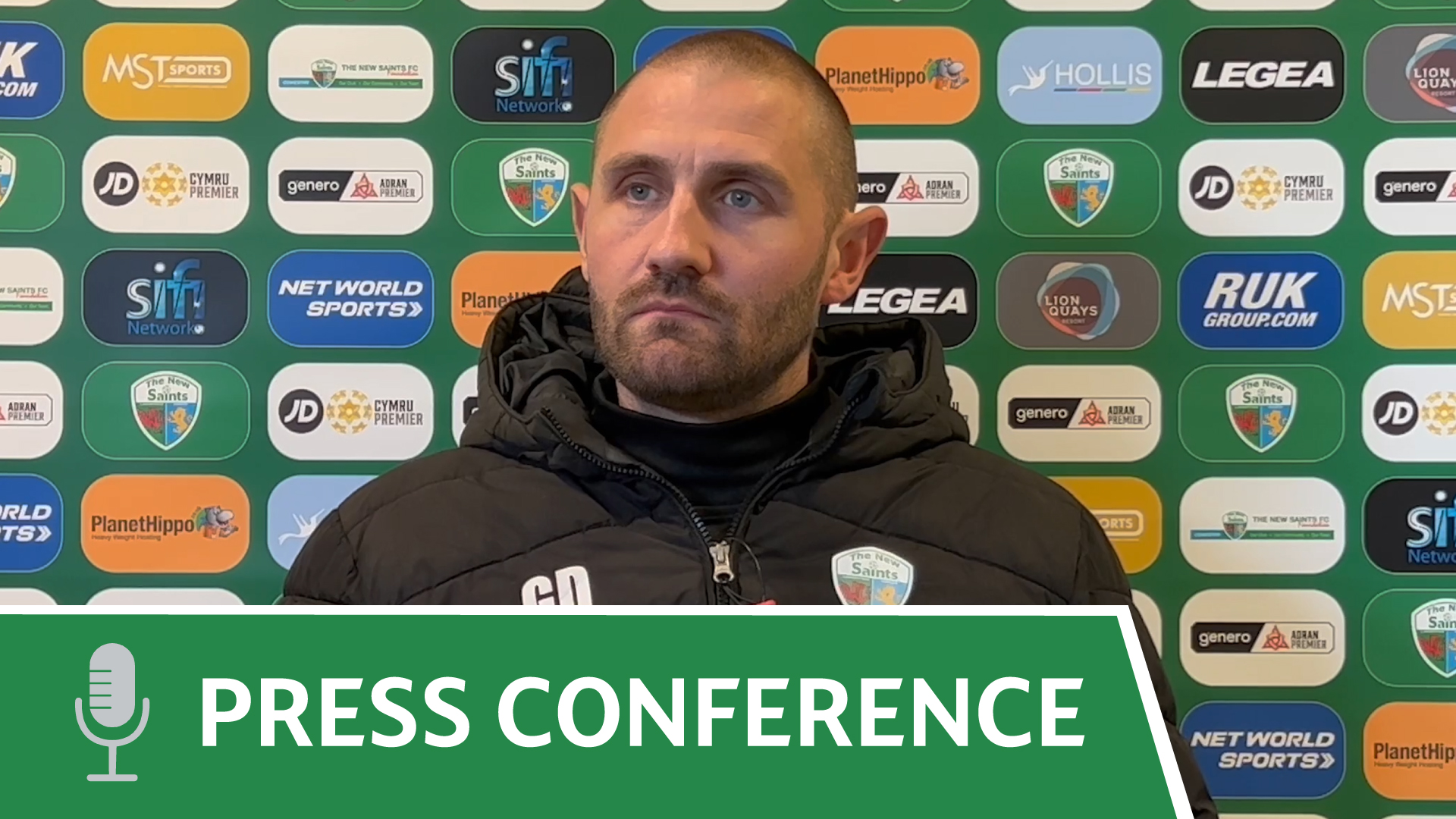 Greg-press-conference-image